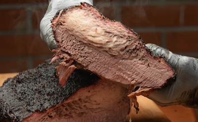 What Does Brisket Taste Like? A Comprehensive Guide to the Flavors and Textures of This BBQ Staple